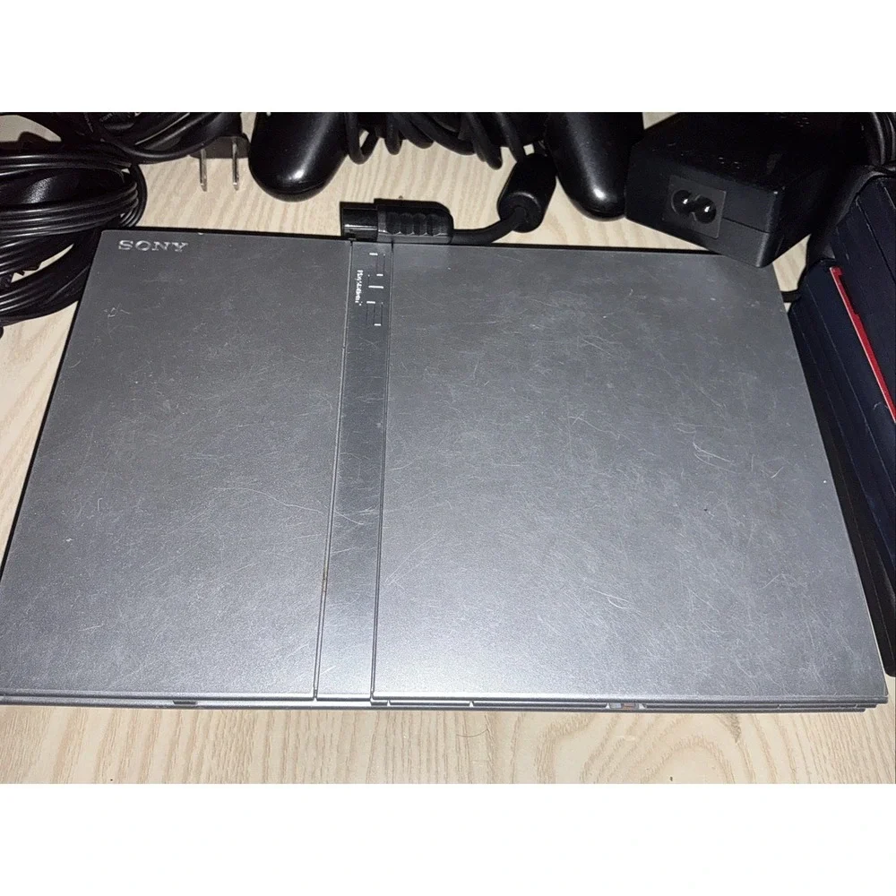 playstation 2 console,‎ 1 Wireless Controller 1 Reg Controller ,5 Games